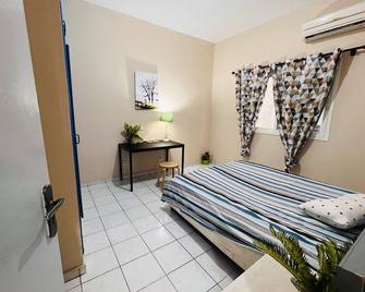 Cómoda Habitación en apartamento Zen - 马拉博 - 睡房
