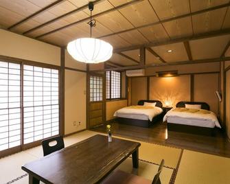 花风月宿屋酒店 - 南小国町 - 睡房