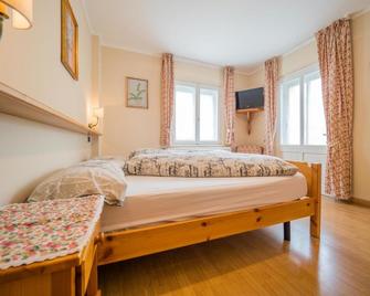Apartments & Rooms Myholidaylivigno - 利维尼奥 - 睡房