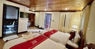 帕塔纳别墅酒店 - 琅勃拉邦 - 睡房
