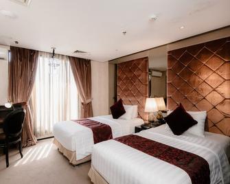 印尼萬隆阿瑪魯薩酒店 - 万隆 - 睡房