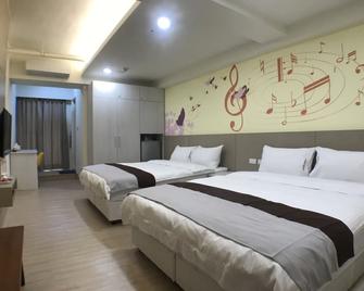 美丽岛音乐城商旅 - 高雄市 - 睡房