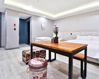 Daegu Seongseo Hotel Series 5.0 - 大邱 - 睡房