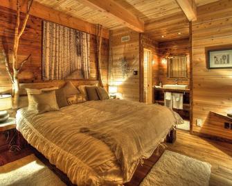 Les Bouleaux - Les Chalets Spa Canada - 拉马尔拜 - 睡房
