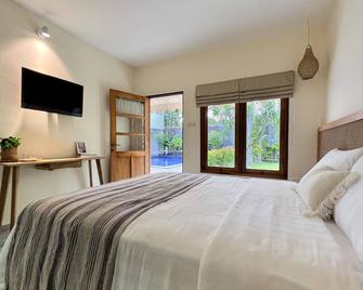 Roots Hotel Senggigi 根源酒店森吉吉 - 圣吉吉 - 睡房