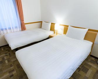 米子站前东横inn酒店 - 米子市 - 睡房