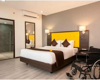 孟買艾羅里納維芒果飯店 - 纳威孟买 - 睡房