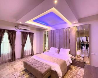 God's Touch Apartments Signature - 拉戈 - 睡房