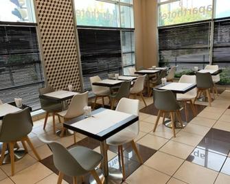 格勒诺布尔阿乐皮斯普公寓式酒店 - 格勒诺布尔 - 餐馆