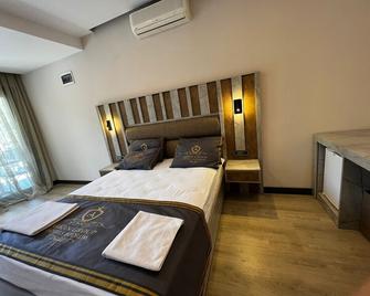 Byakkan Hotel - 阿克亚拉尔 - 睡房
