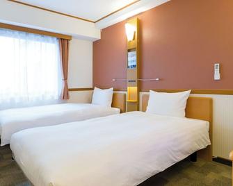 盛冈站前东横inn酒店 - 盛冈市 - 睡房