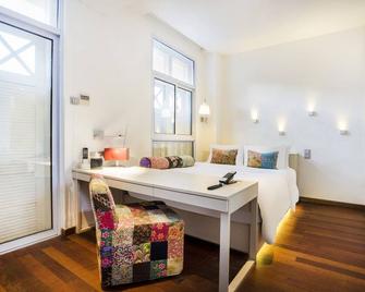 Hotel Calmo的daulat - 新加坡 - 睡房