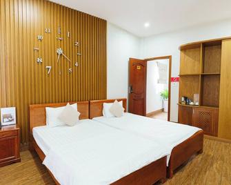 阮泰2号酒店 - 胡志明市 - 睡房
