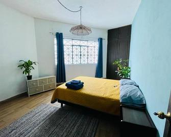 Experience comfort at our lovely 1-bed apartment near Foro Sol in Mexico City - 墨西哥城 - 睡房