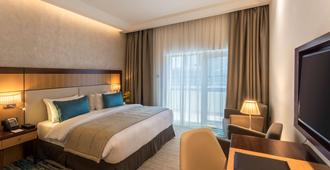 金色郁金香阿尔滩亚酒店式公寓 - 迪拜 - 睡房