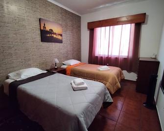 Apartamentos Lisboa - 波尔图镇 - 睡房