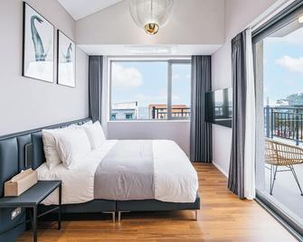 Ddosi Aewol Pool Villa - 济州 - 睡房