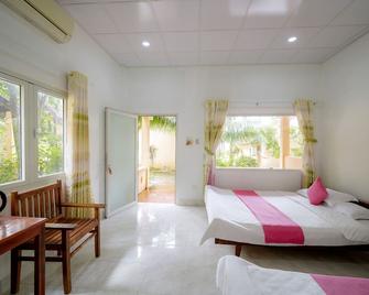 泰谭梯恩酒店 - Phu Quoc - 睡房