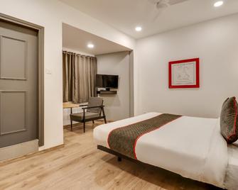 Townhouse 591 Hotel Woodland - 那格浦尔 - 睡房