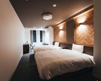 Double Twin Room 5east Nonsmoking / Saga Saga - 佐贺市 - 睡房