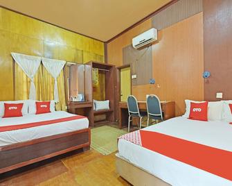 OYO 90595彩虹海滩度假村cherating - 关丹 - 睡房