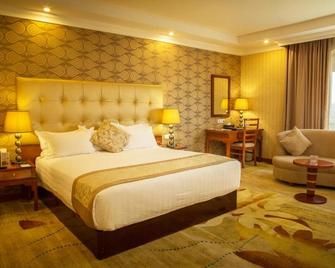 卡赞驰斯木星国际酒店 - 亚的斯亚贝巴 - 睡房
