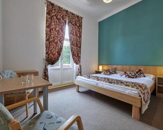 Hotel Mezní Louka - 赫恩斯科 - 睡房