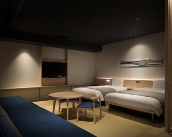 薄野坎帕纳船舶酒店 - 札幌 - 睡房