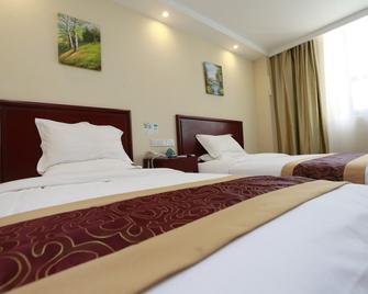 Greentree Inn Nanjing Jingwu Road Yueyuan Express Hotel - 南京 - 睡房