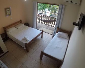 小屋旅馆 - 伊塔卡雷 - 睡房