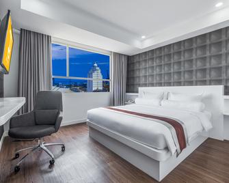 Royal Bay Hotel Makassar - 马卡萨 - 睡房